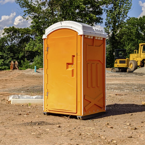 how often are the portable restrooms cleaned and serviced during a rental period in Harned KY